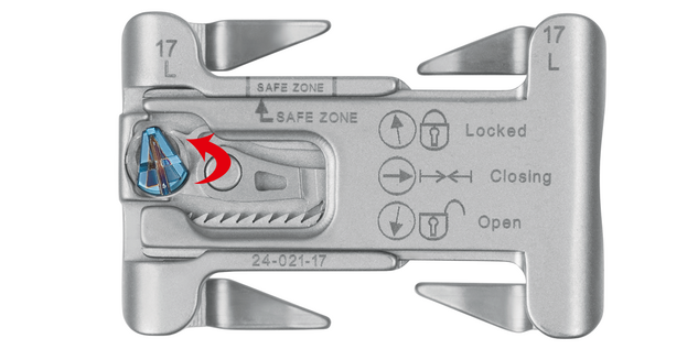 The ratcheting mechanism is engaged to ensure the two sternal halves remain in place. 